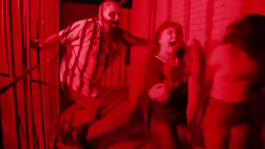A group of undead actors in red light